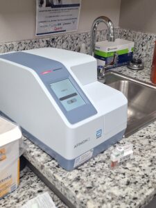 A photo of an Afinion 2, a multi-assay analyzer that provides testing at the point-of-care.