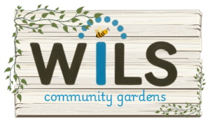 WiLS Community Gardens logo on a garden sign with flowers and vines and bees